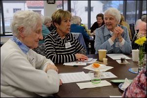 Sr. Rosalma Kmiec, left, Darlene Johnson, and Sr. Magdala Davlin.