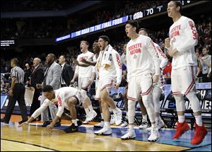 Players on the Ohio State bench react late in the second half the Buckeyes' first round NCAA Tournament win over South Dakota State Thursday. Ohio State plays Gonzaga Saturday evening in the second round.