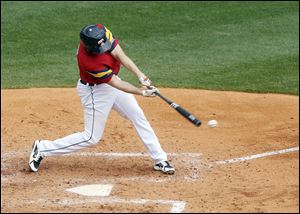 Toledo's Chad Huffman hits the ball against Indianapolis at Fifth Third Field earlier this season. Huffman's two home runs at Columbus Thursday carried the Hens to a come-from-behind win.