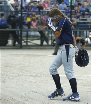 Whiteford's Baylee Baldwin makes the third out at first base, stranding loaded bases in the fourth inning during the 2018 MHSAA Quarterfinal against Centreville at Bailey Park Complex in Battle Creek, Mich.