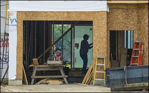 A home is under construction in a new plat of the Brookside development Tuesday, June 26, 2018, in Sylvania Township.