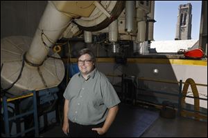 Dr. Noel Richardson, a Ritter Postdoctoral Research Associate in the University of Toledo Department of Physics and Astronomy, is pictured Friday, July 6, 2018, at the Brooks Observatory at the University of Toledo. 