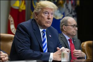 President Donald Trump met with automotive industries executives at the White House in May, 2018.