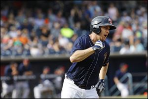 Chad Huffman of the Toledo Mud Hens reacts after belting a 2-run homer in the eighth inning of Sunday's game against the Columbus Clippers. The Mud Hens won, 3-2, to move within 1/2 game of the Wild Card playoff spot.