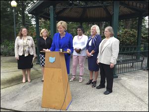 Betty Sutton, Democratic candidate for lieutenant governor, speaks about women’s issues at the Old West End Commons on Thursday. 