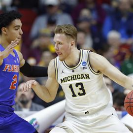 Michigan Basketball: Will Jordan Poole or Iggy leave for NBA draft?