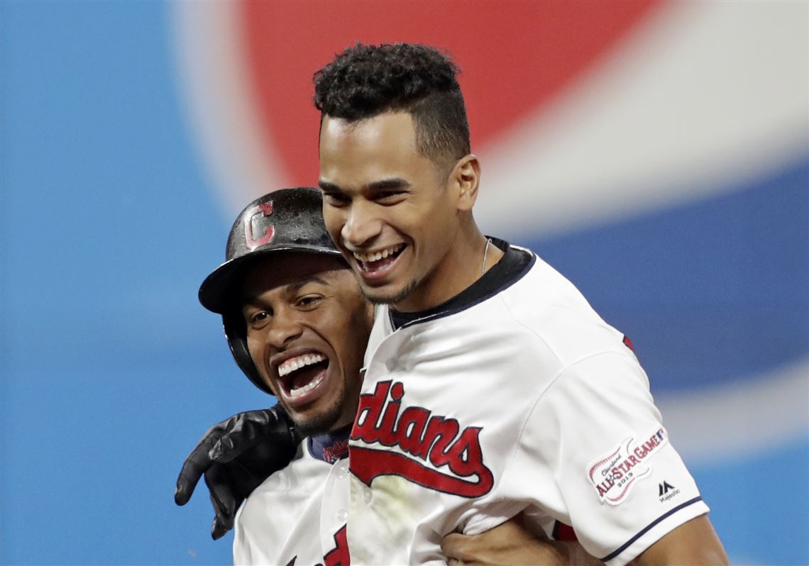 April 3, 2018: Cleveland Indians third baseman Jose Ramirez (11) and  Cleveland Indians shortstop Francisco Lindor (12) celebrates after Ramirez  hit a two run homer in the first inning in the game