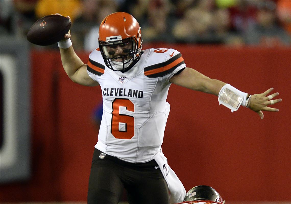 Cleveland Browns cornerback Denzel Ward knocks the ball away from