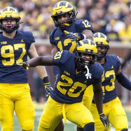 Ex-teammates Rashan Gary, Aidan Hutchinson come at game with equal