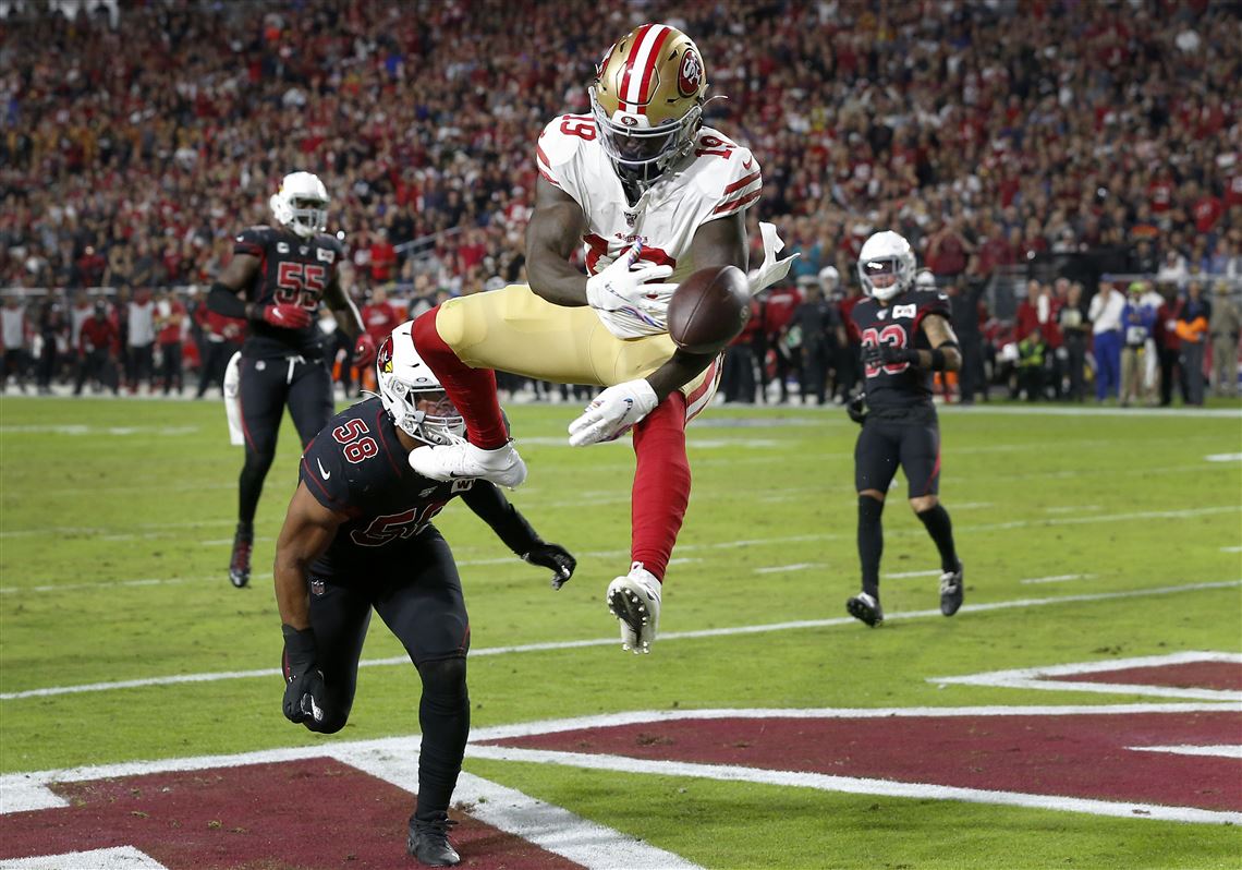 Jimmy Garoppolo tosses four touchdowns in 49ers' rout of Cardinals