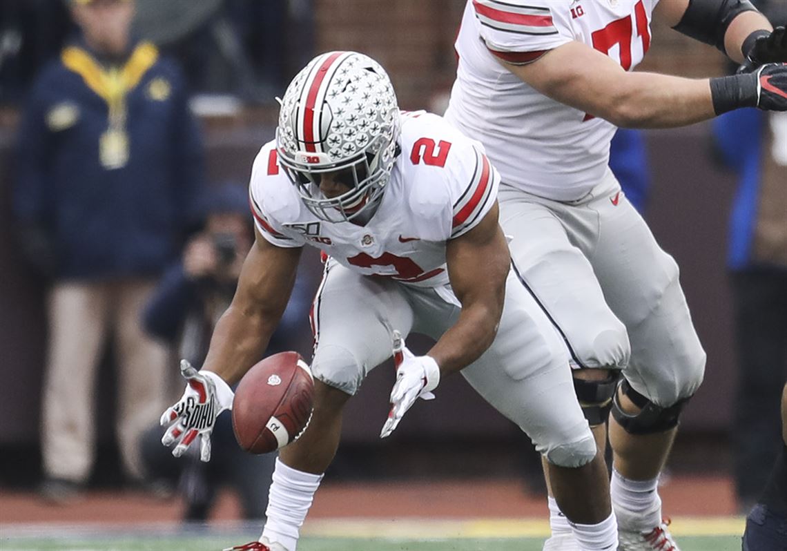 Former Ohio State football star J.K. Dobbins wore Michigan shirt