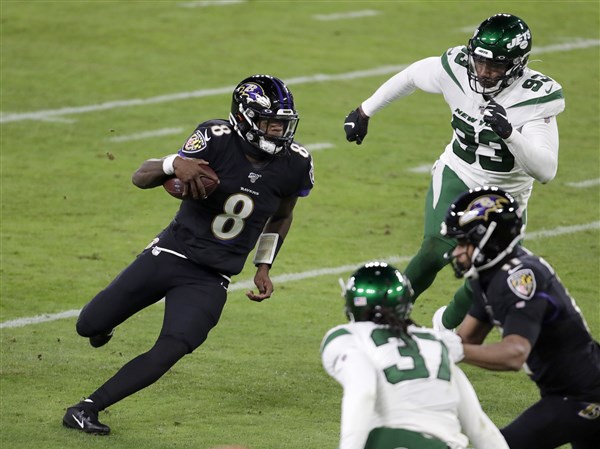 Jackson, Ravens beat Jets, 42-21, to clinch AFC North title