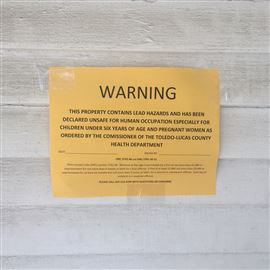 Placards like this one on an East Toledo home were posted by Toledo-Lucas County Health Department officials after the Ohio Department of Health released a list of properties in the state with orders to vacate due to untreated lead hazards.