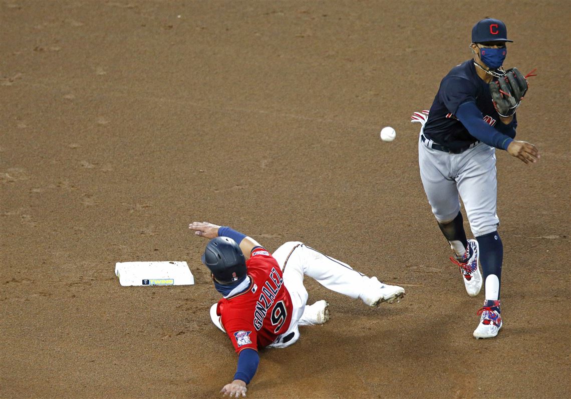 Minnesota Twins starting pitcher Randy Dobnak runs to first base