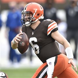 Cleveland Browns safety Sheldrick Redwine, left, celebrates with teammates  after an interception during the second half of an NFL football game  against the Indianapolis Colts, Sunday, Oct. 11, 2020, in Cleveland. The