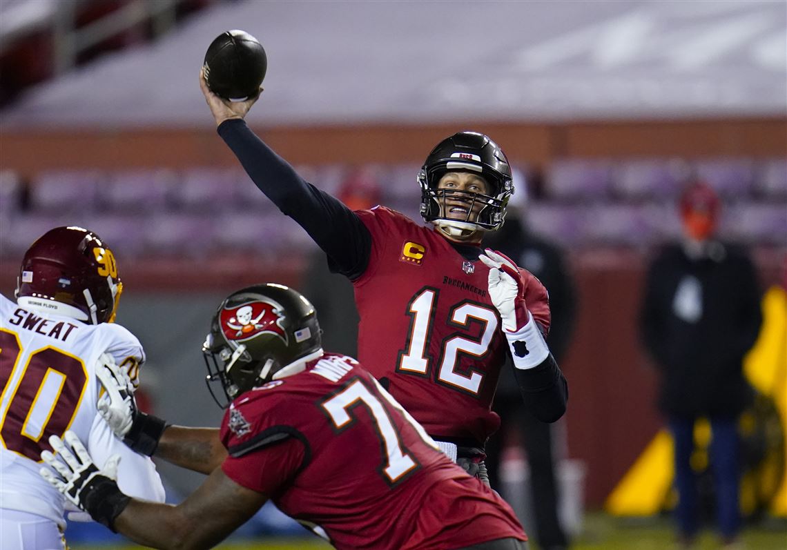 Saturday's NFL playoffs: Tom Brady leads Bucs to first postseason win since  2002