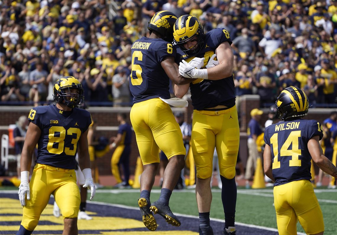 Corum s 3 TDs help No. 25 Michigan rout N. Illinois 63 10 The Blade