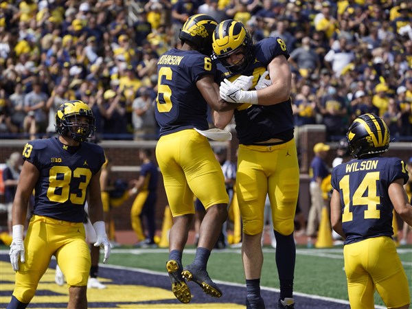 Corum s 3 TDs help No. 25 Michigan rout N. Illinois 63 10 The Blade