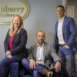 Danberry Realtors was named the 2021 Top Workplace for a large company. Pictured are co-owners, from left, Maggie Fawcett, Kevin Warren, and Dan McQuillen.  (THE BLADE/PHILLIP L. KAPLAN)