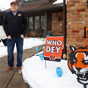 Mayor Richard Carr with his Bengals yard decorations at his home in Maumee on Thursday, Feb. 10, 2022.