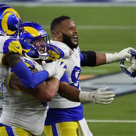 Hip Hop Halftime at Super Bowl: 50 Cent hangs upside down, Guyton