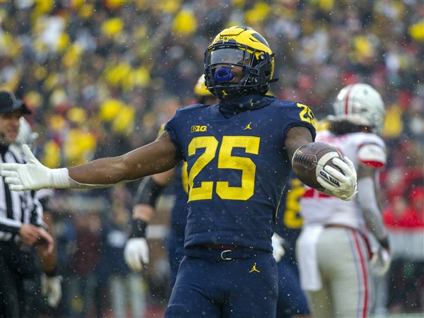 Michigan's Haskins, Stueber selected in final day of draft