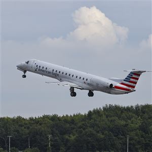 American Airlinesu2019 final flight out of Toledo takes off Tuesday at the Eugene F. Kranz Toledo Express Airport in Swanton. 