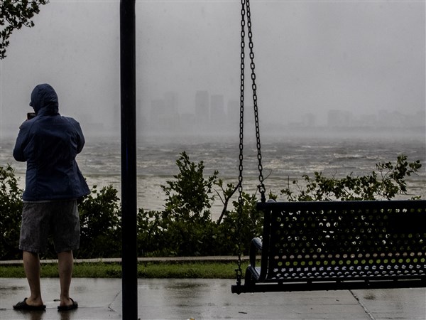 Ian swamps southwest Florida, trapping people in homes