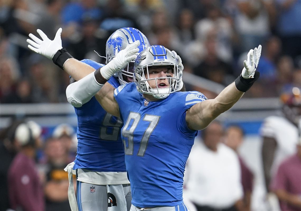 Detroit Lions defensive end Aidan Hutchinson (97) celebrates with