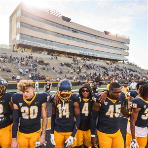 The Toledo Rockets Football Team sings the alma mater after a Mid-American Conference divisional matchup against the Central Michigan Chippewas on Oct. 1 at the Glass Bowl in Toledo. 