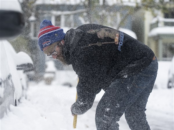 Members of Buffalo Bills had to dig their cars out of snow after Christmas  blizzard