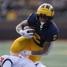 Michigan RB Corum expected to have knee surgery source says The