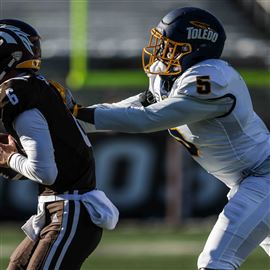 October 5, 2019: Western Michigan LeVante Bellamy #2 tries to shake off a  Toledo defender during the NCAA football game between the Toledo rockets  and the Western Michigan Broncos at the Glass