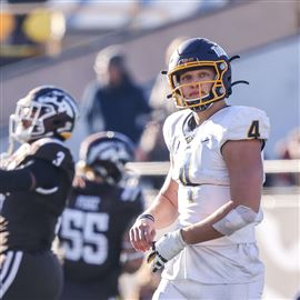 October 5, 2019: Western Michigan LeVante Bellamy #2 tries to shake off a  Toledo defender during the NCAA football game between the Toledo rockets  and the Western Michigan Broncos at the Glass