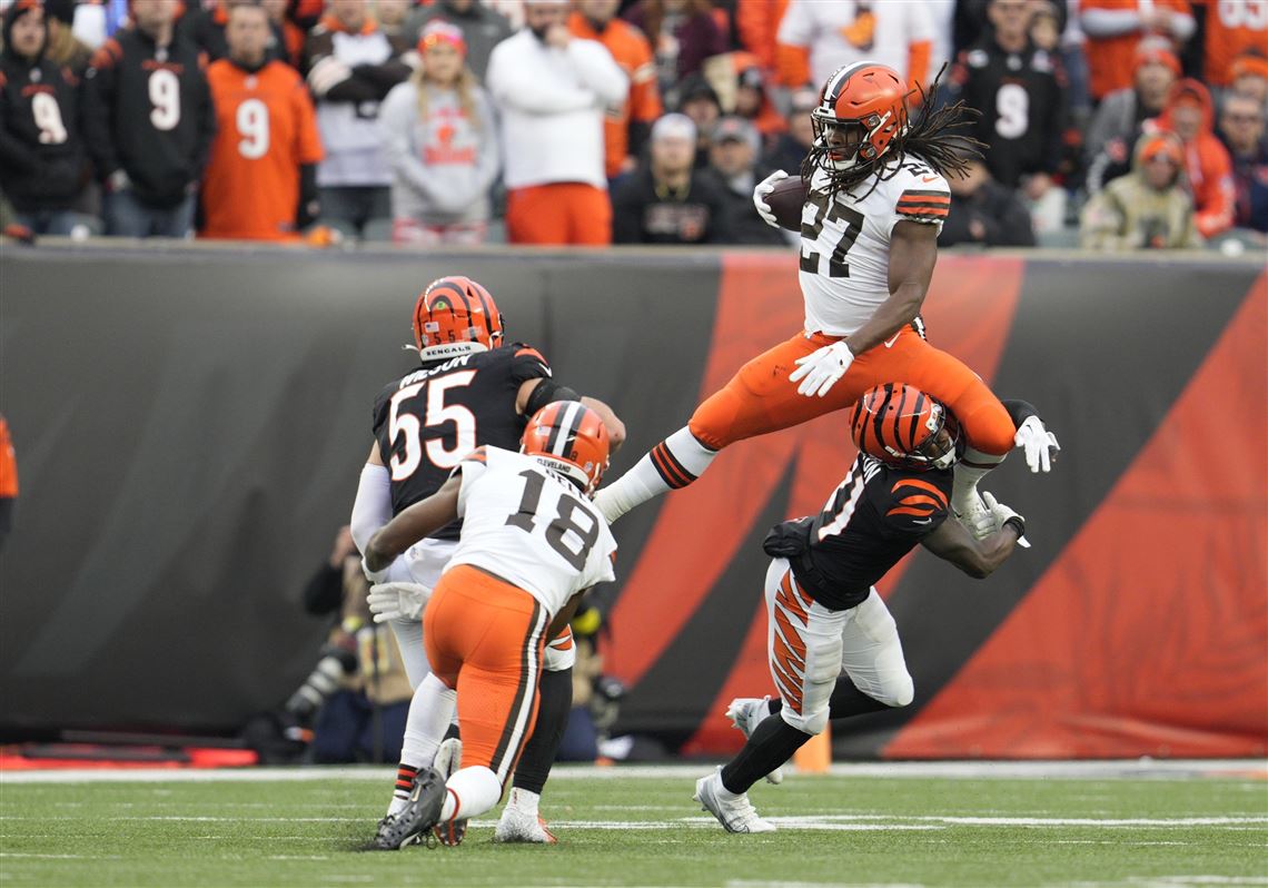 Cincinnati Bengals' wide receiver Trent Taylor (11) is tackled by