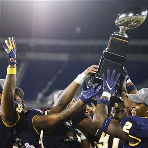 University Toledo players celebrates defeating Liberty University, 21-19, during the Boca Raton Bowl on Dec. 20 at FAU Stadium in Boca Raton, Florida.