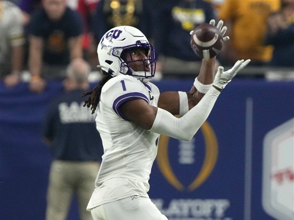 No. 3 TCU upsets No. 2 Michigan 51-45 in wild CFP semifinal at Fiesta Bowl