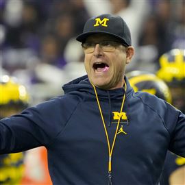 John Harbaugh denies report that family is pushing Jim Harbaugh to