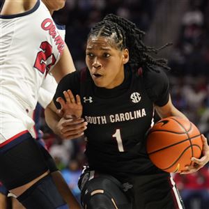 South Carolina guard Zia Cooke (1) drives against Mississippi guard Elauna Eaton (23) during the first half of an NCAA college basketball game in Oxford, Miss., Feb. 19.