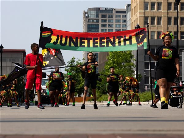 Toledoans celebrate as Juneteenth parade moves through downtown