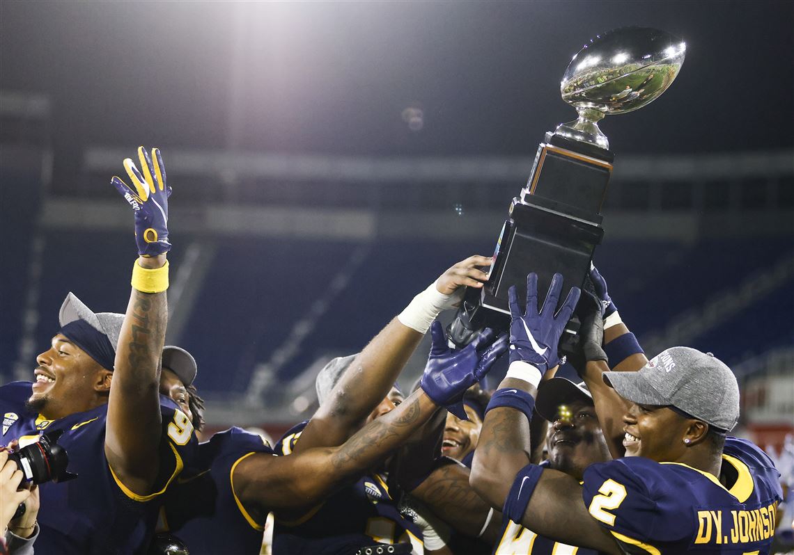 Central Michigan's Eric Fisher holds Super Bowl trophy, and maybe