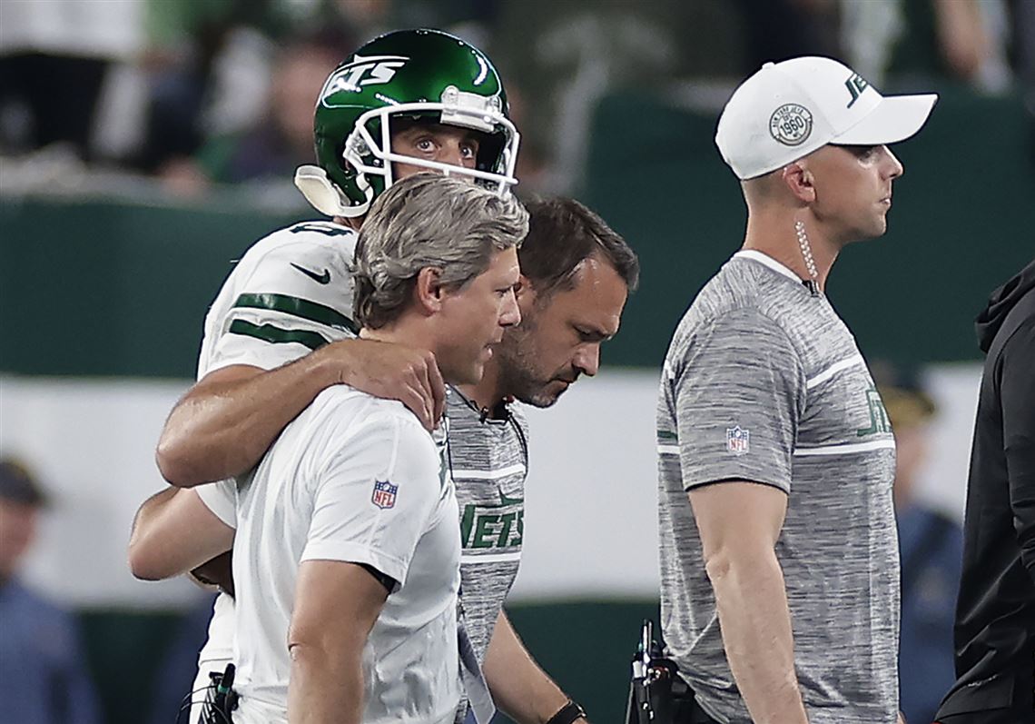 NY Jets' Aaron Rodgers carted off with ankle injury on first drive