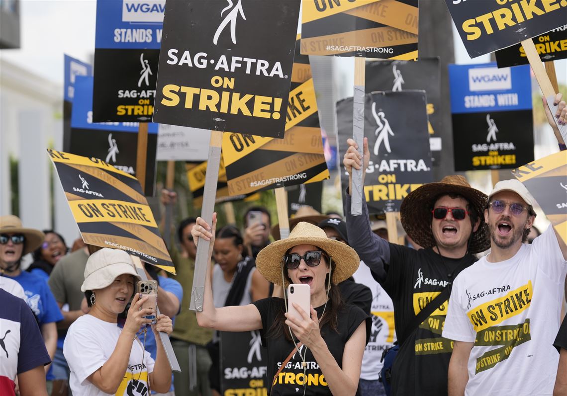 Punk band boosts morale on Jeep picket line