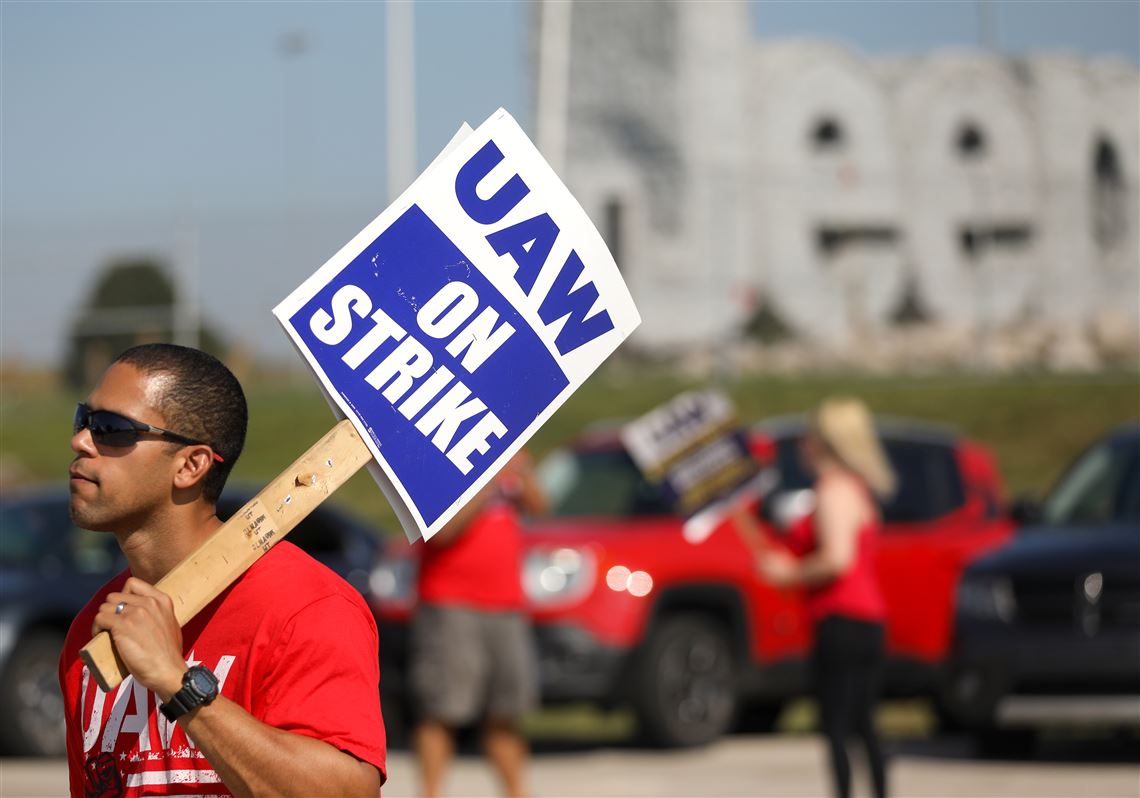 Punk band boosts morale on Jeep picket line