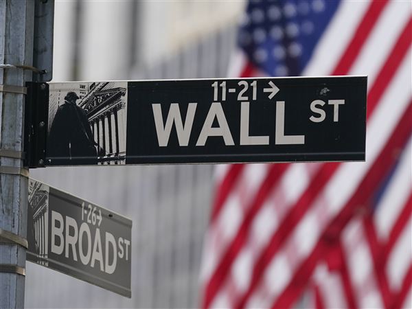 Stocks waver in muted holiday trading on Wall Street