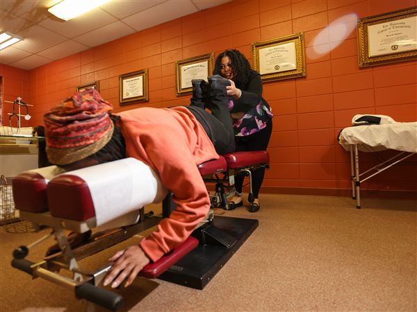 Chiropractor adjusting bodies and mindsets, paves the way for women