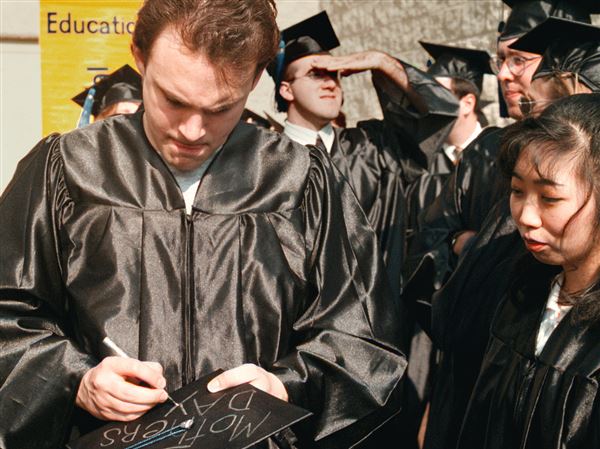 Monday Memories: Grad’s hat made a handy slate for honoring mom