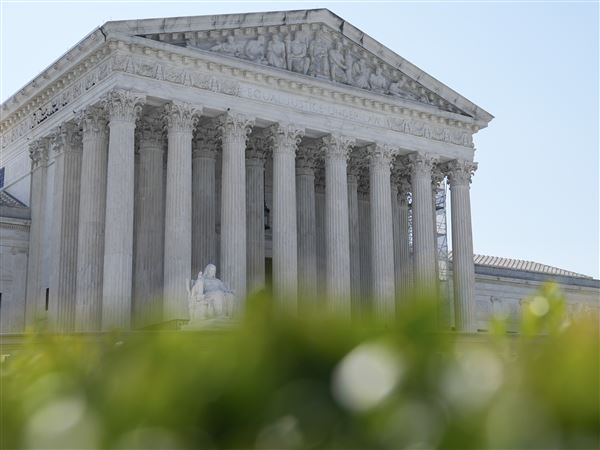 Supreme Court upholds law barring domestic abusers from owning guns