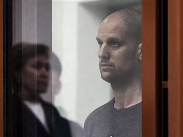 Russian conviction of U.S. reporter for espionage seen as politically motivated