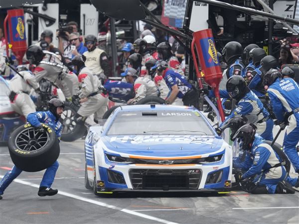 Larson charges late for Brickyard 400 victory